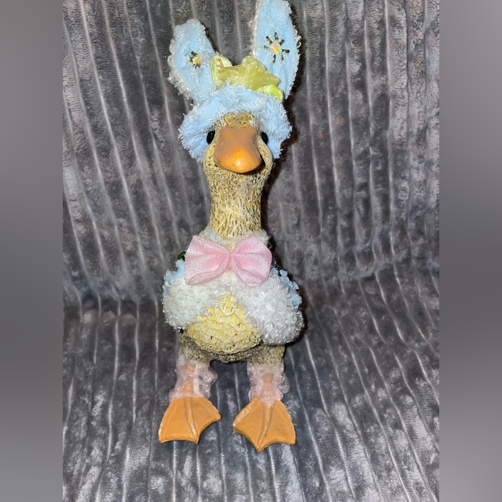 Duck dressed up in a pretty Easter Bunny outfit. Ears to feet 11” tall.